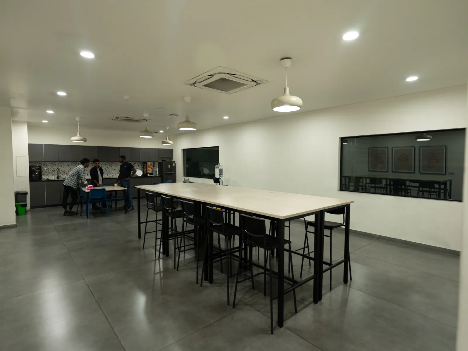 Breakout area with high table and pantry — LICO
